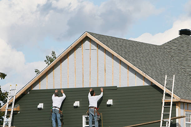 Professional Siding technician working in Wilson, NC